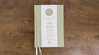 Daily Gratitude Journal on a wooden surface